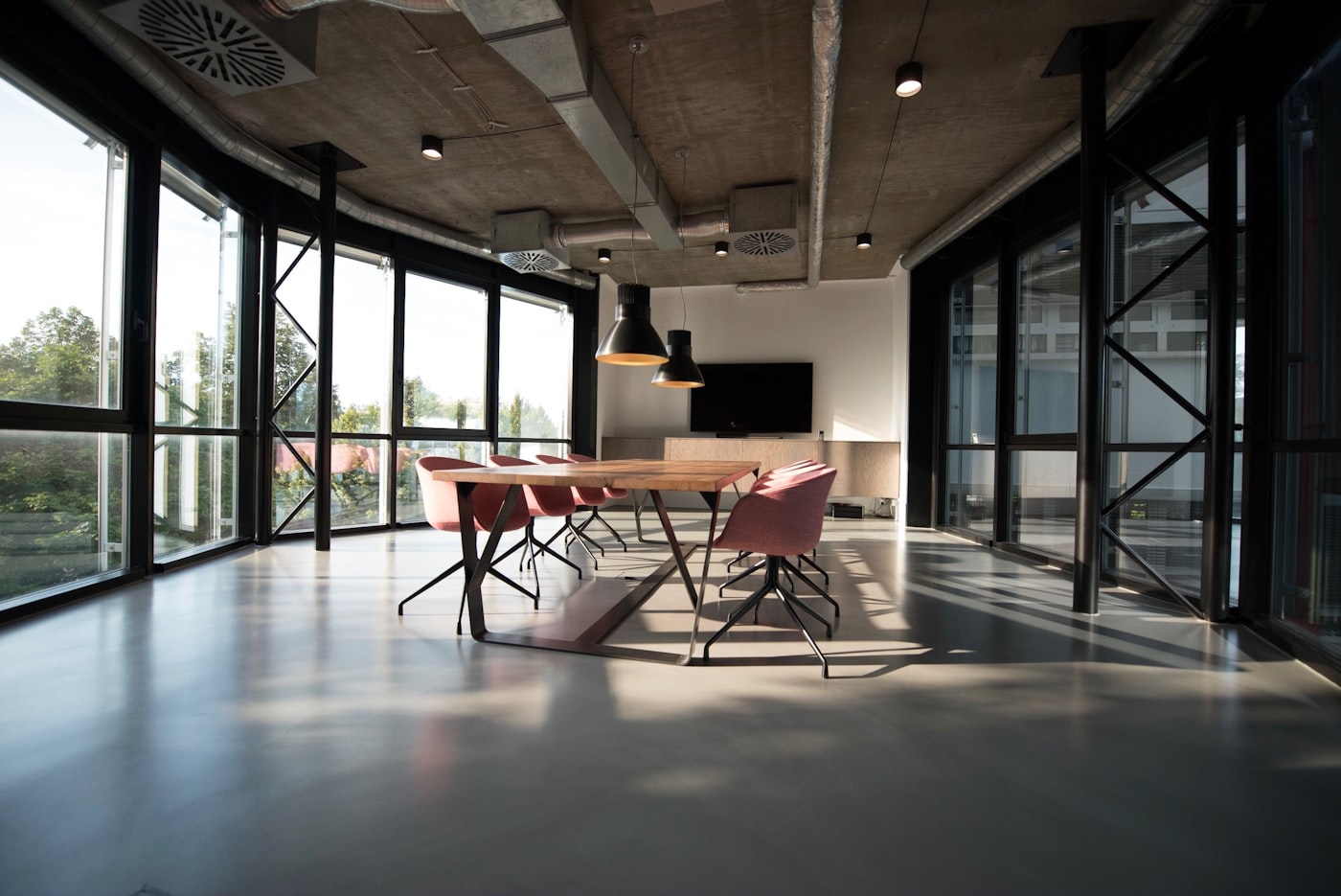 Modern office with desks and warm light